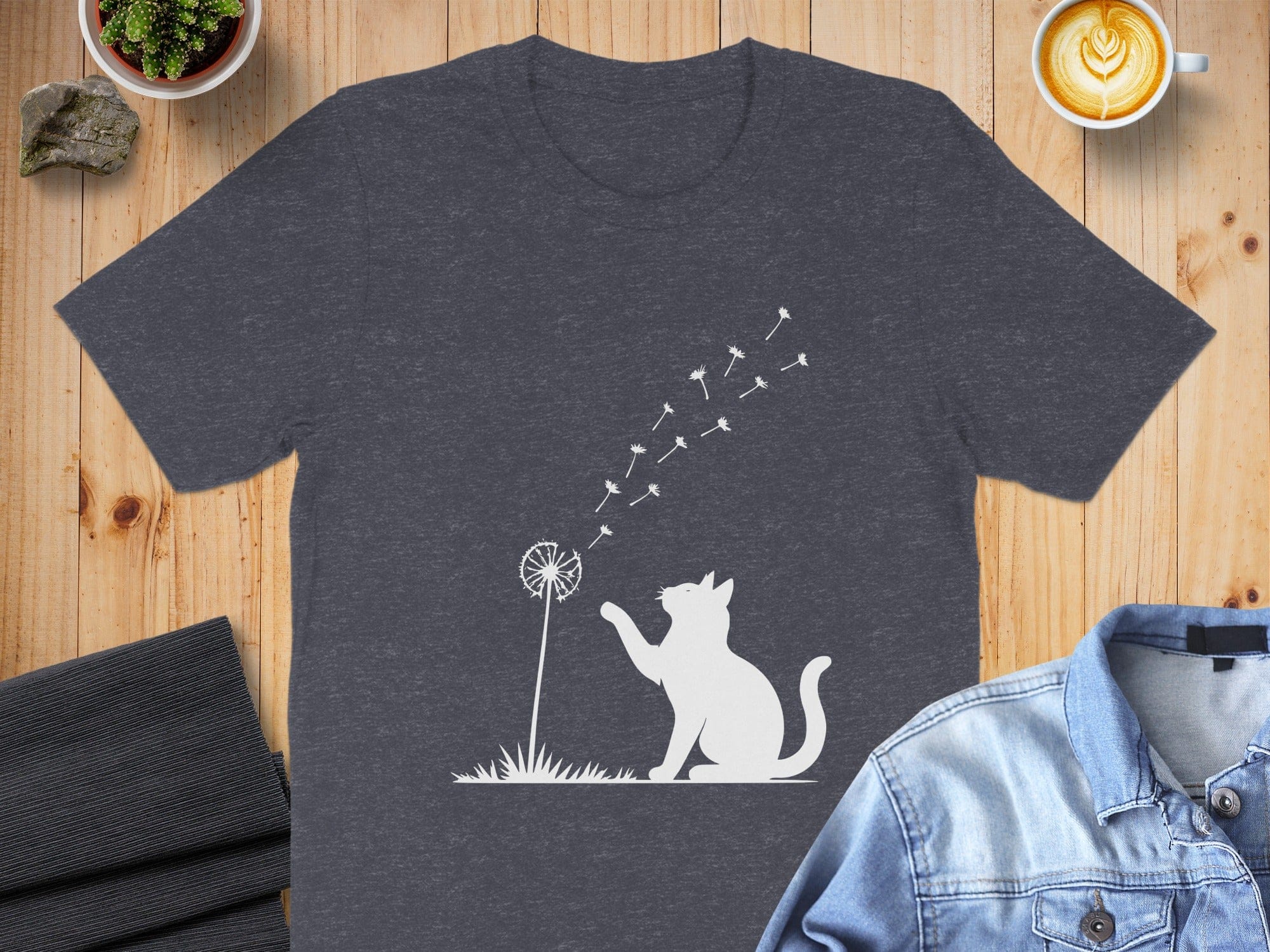 Cat and Dandelion Graphic Tee on Wooden Background
