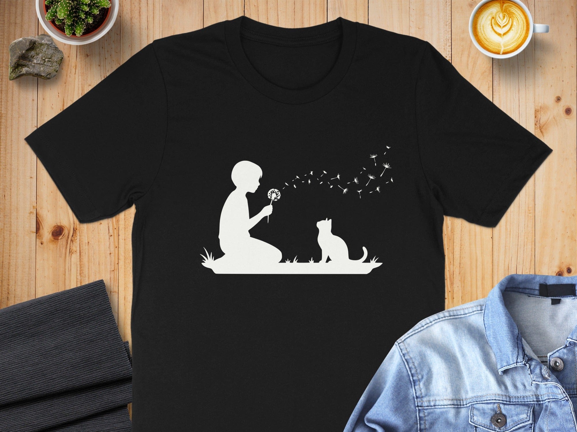 Black T-shirt with Child and Cat Dandelion Design