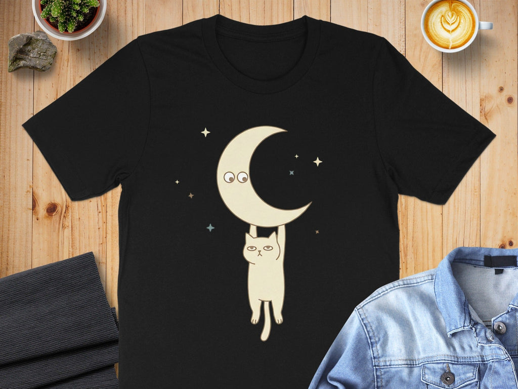 Cute Cat Hanging on Crescent Moon Graphic Shirt