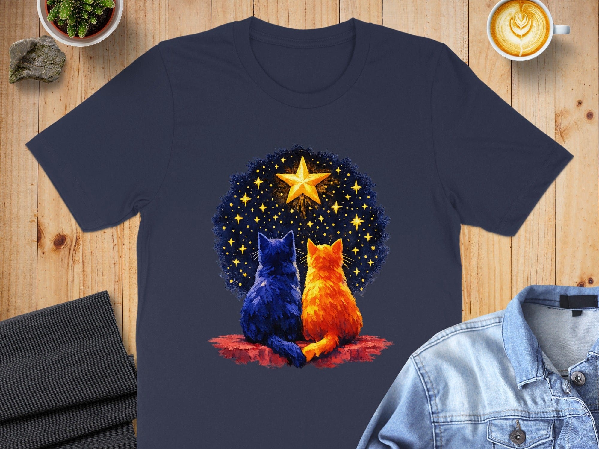 Star Gazing Cats Artwork on a Dark Blue T-Shirt